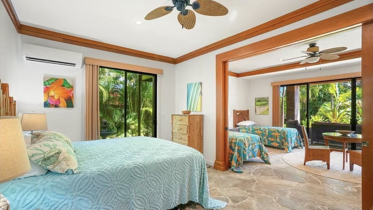 Fourth Bedroom, king bed with sliding door to the garden
