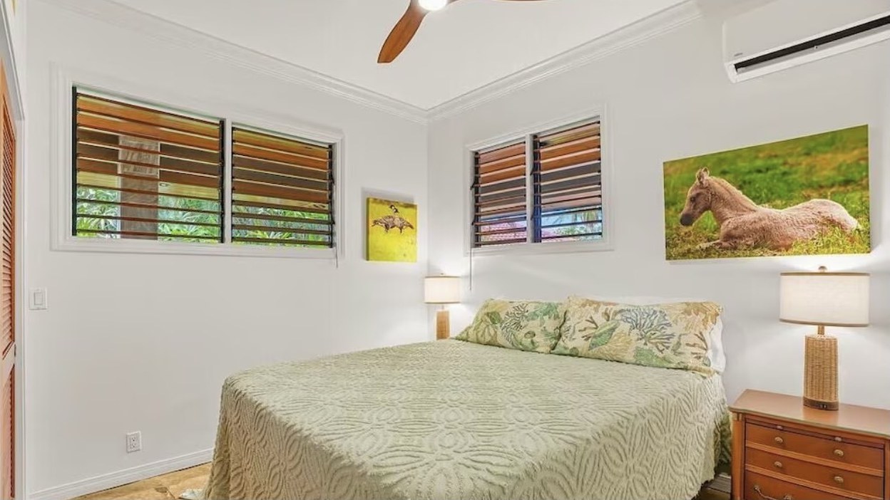 Second Bedroom, king bed with nightstands and louvered windows